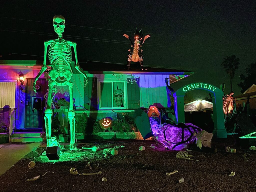 home-with-nightmare-halloween-decorations-at-night-2023-11-27-05-30-32-utc